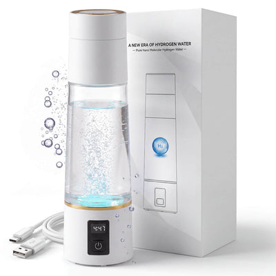 A portable hydrogen water maker with a clear glass chamber showing bubbling water, a white base with a digital display, a USB charging cable, and its white retail box on a clean white background.